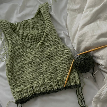 green sweater vest