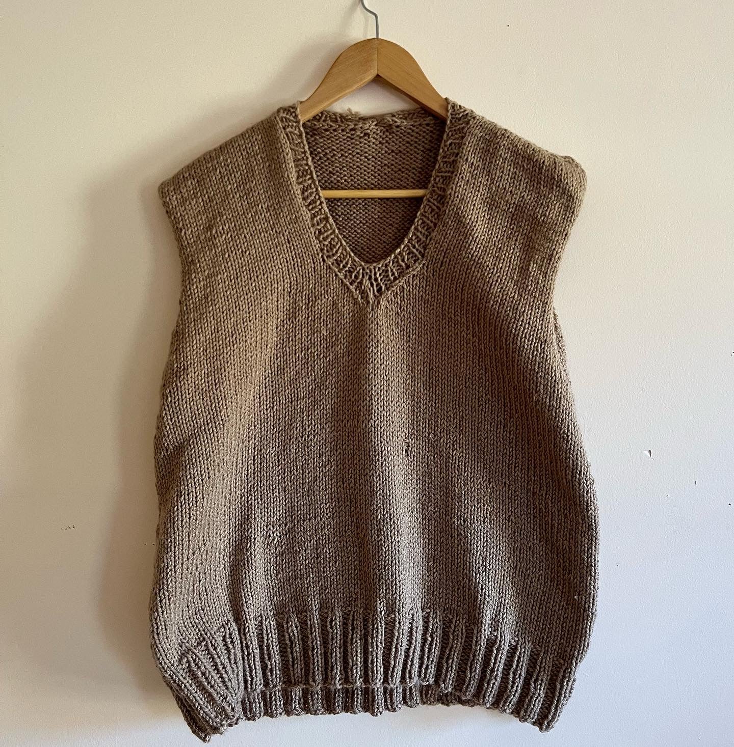 brown sweater vest