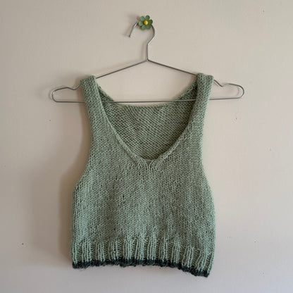 green sweater vest